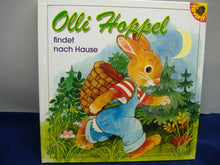 Laden Sie das Bild in den Galerie-Viewer, Osterset 3-teilig* Puzzleball, Malbuch, Buch &quot;Olli Hoppel findet nach Haus&quot; Neu