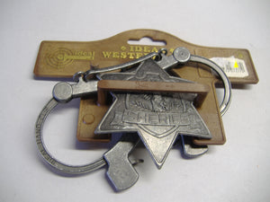 Fasching Kinder Cowboyweste schwarz Gr. 128 / Sheriffstern mit Handschellen/ Spielzeugpistole Scorpion antik Neu & OVP